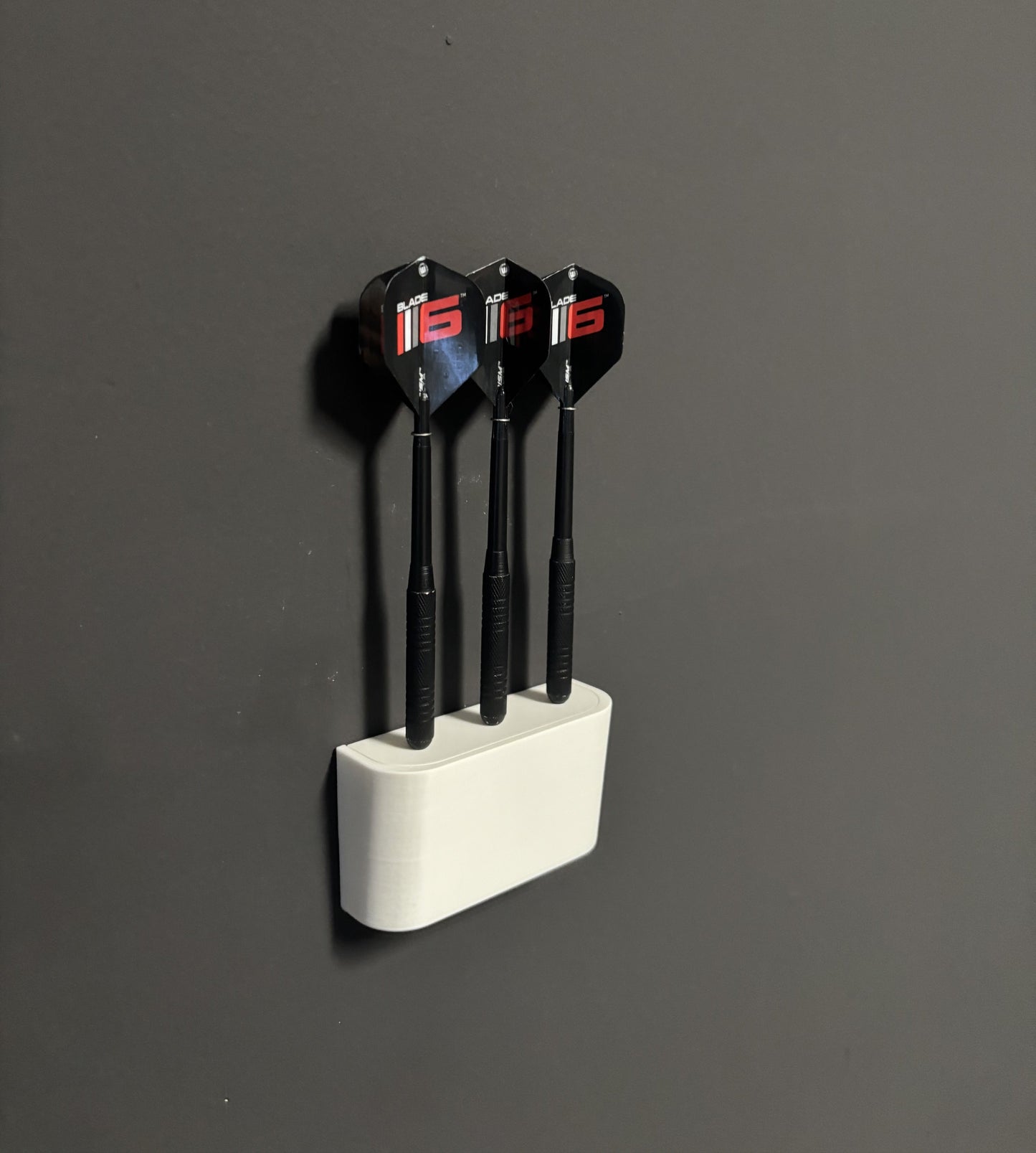 Dartpfeilhalter für die Wand